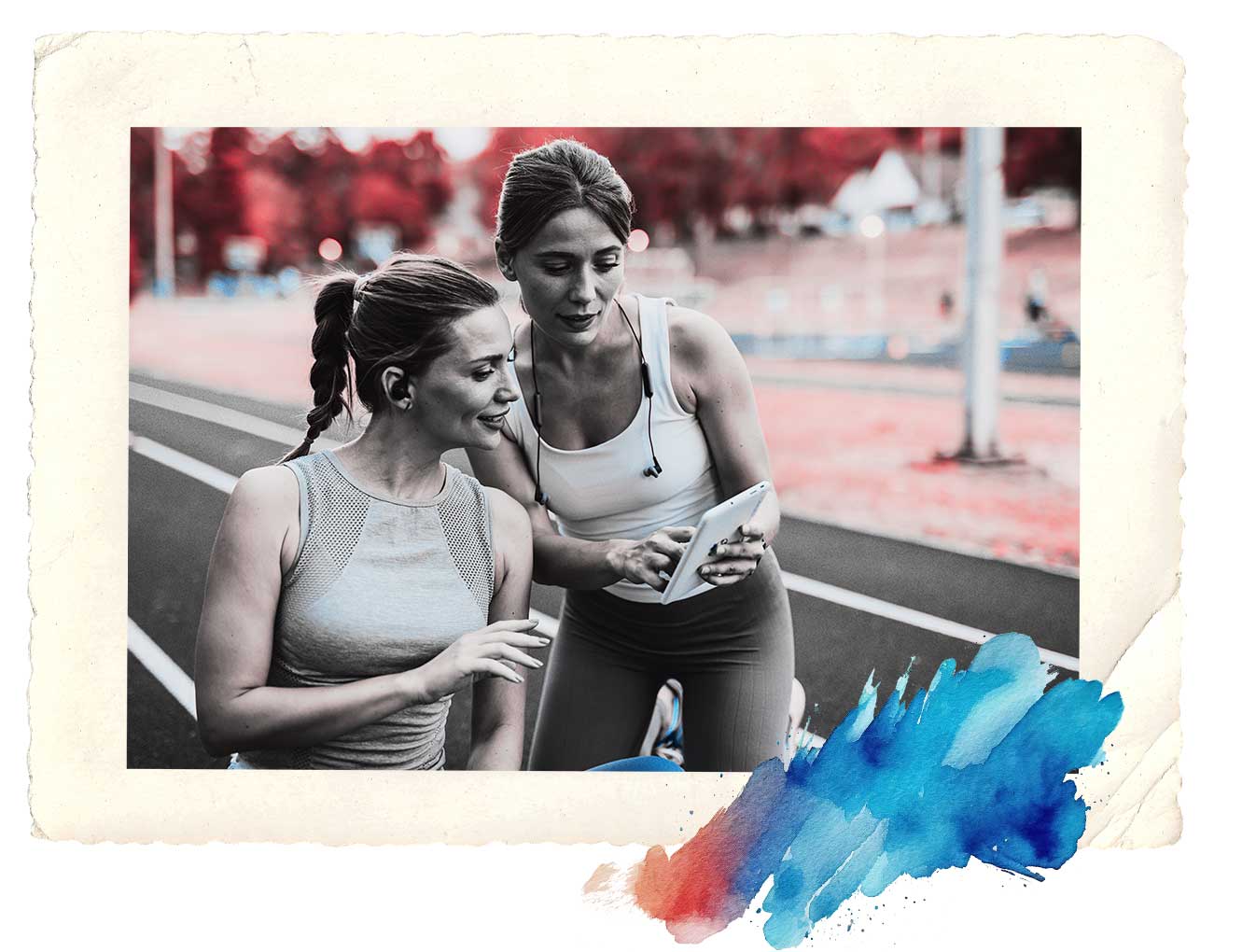 girls on track with tablet